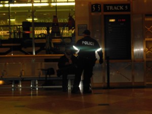 a cop in penn station throwing homeless humans out into the cold.